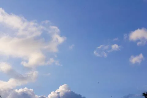 Blue sky background with clouds. Clouds on a clear day 스톡 사진