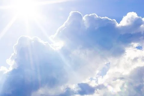 Blue sky background with clouds. Clouds on a clear day Stock Photos