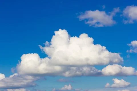 Blue sky background with clouds. Clouds on a clear day Photos