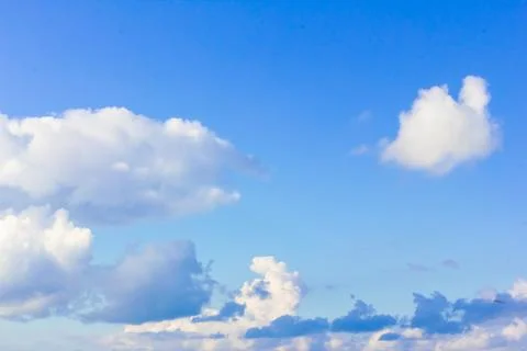 Blue sky background with clouds. Clouds on a clear day Foto stock