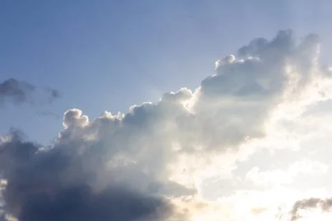 Blue sky background with clouds. Clouds on a clear day Stock Photos