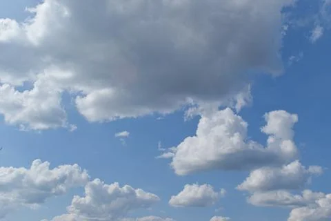 Blue sky background with clouds. Nature abstract composition Stock Photos