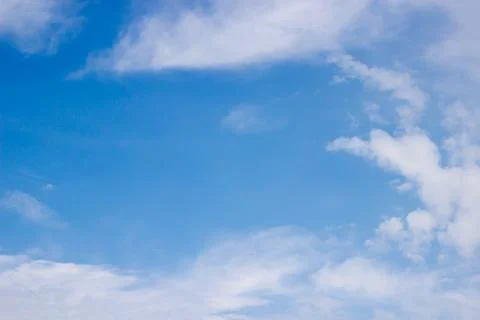 Blue sky background with clouds Stock Photos