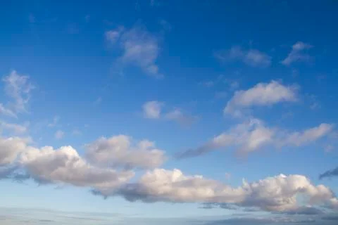 Blue sky background with clouds Stock Photos