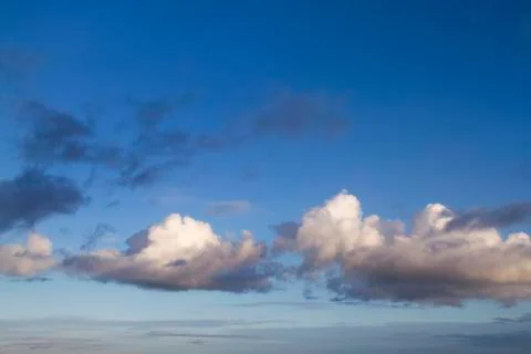 Blue sky background with clouds Stock Photos