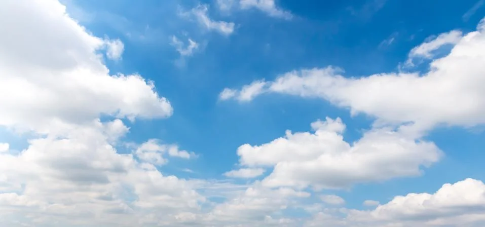 Blue sky background with clouds Stock Photos