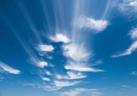 Blue sky background with clouds Фото