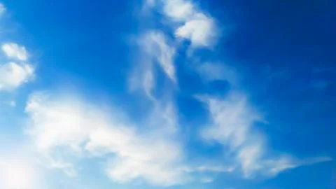 Blue sky background with clouds. Stock Photos