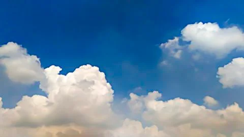 Blue sky background with clouds. Stock Photos