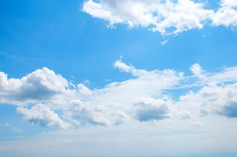 Blue sky background with clouds Stock Photos