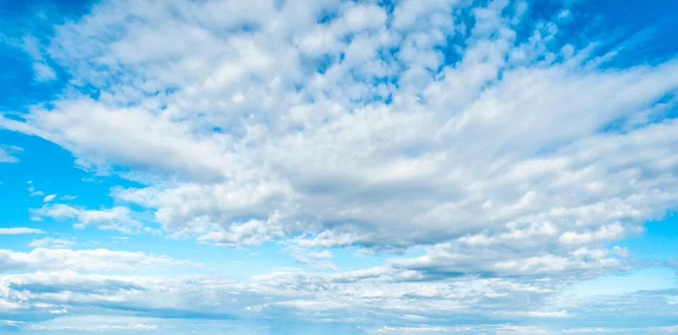 Blue sky background with clouds Stock Photos