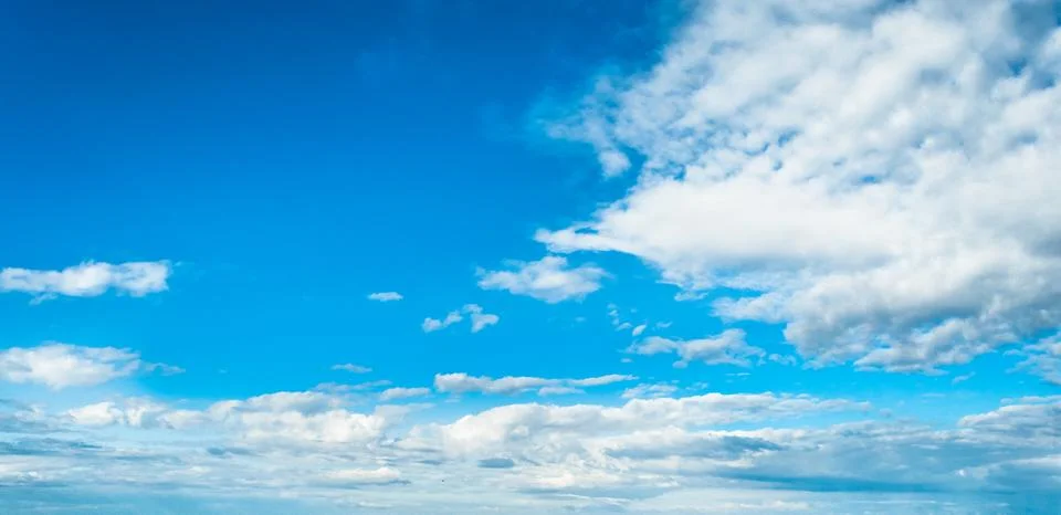 Blue sky background with clouds Stock Photos