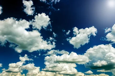 Blue sky background with clouds Stock Photos