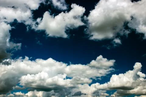 Blue sky background with clouds Stock Photos