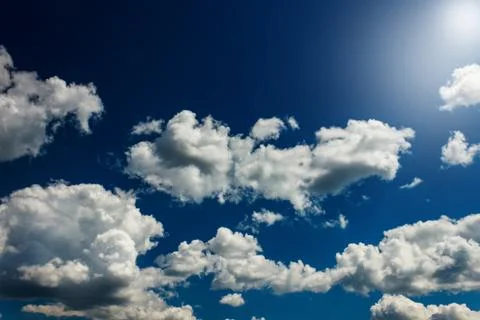 Blue sky background with clouds Stock Photos