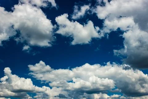 Blue sky background with clouds Stock Photos