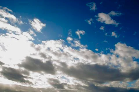 Blue sky background with clouds Stock Photos