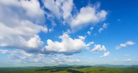 Blue sky background with clouds Stock Photos