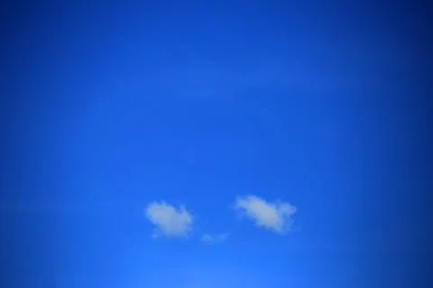 Blue sky background with clouds Stock Photos