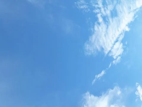 Blue sky background with clouds Foto stock