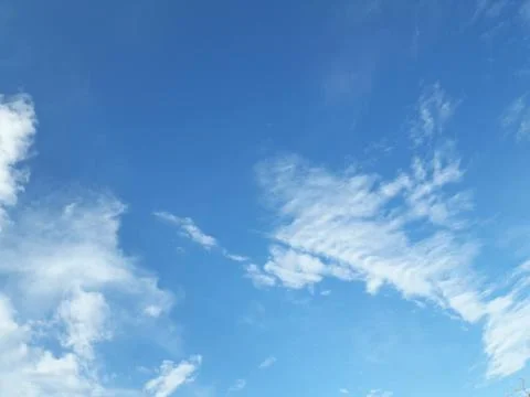 Blue sky background with clouds Stock Photos