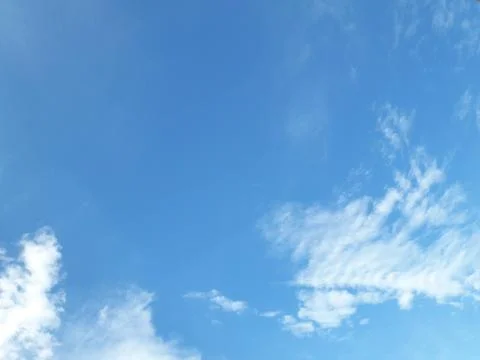 Blue sky background with clouds Stock Photos