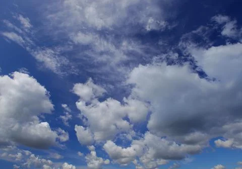 Blue sky background with clouds Stock Photos