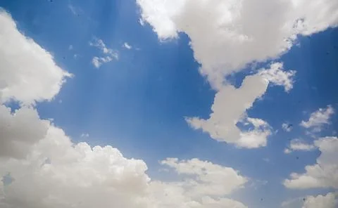 Blue sky background with clouds Stock Photos