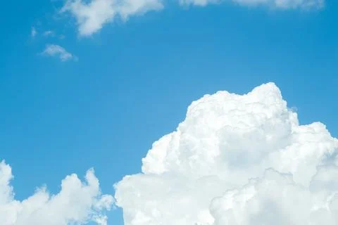 Blue sky background with clouds. Stock Photos