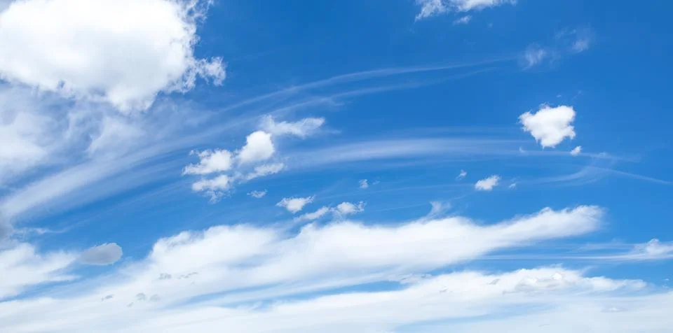 Blue sky background with clouds. Stock Photos