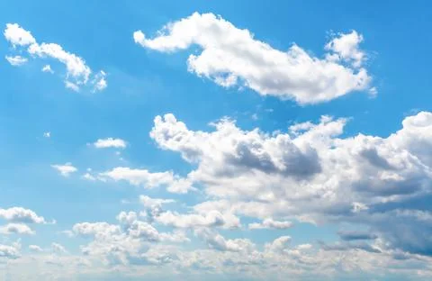 Blue sky background with clouds. Stock Photos