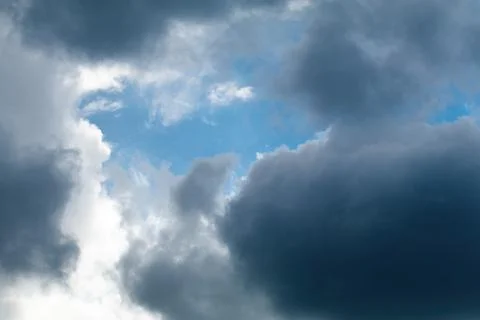 Blue sky background with clouds. Stock Photos