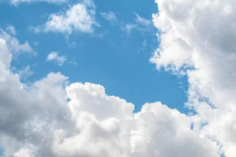 Blue sky background with clouds. Stock Photos