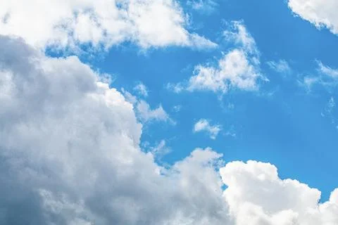 Blue sky background with clouds. Stock Photos