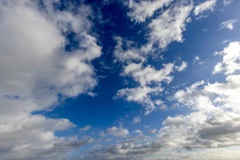 Blue sky background with clouds Stock Photos