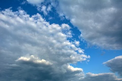 Blue sky background with clouds. Stock Photos