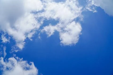 Blue sky background with clouds Stock Photos