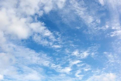 Blue sky background with clouds. Stock Photos