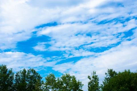 Blue sky background with clouds Stock Photos