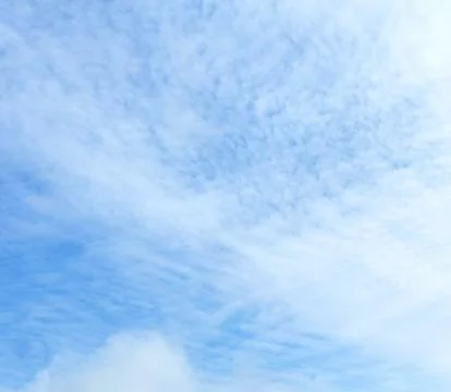 Blue sky background with clouds. Foto stock