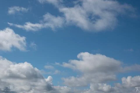 Blue sky background with clouds Stock Photos