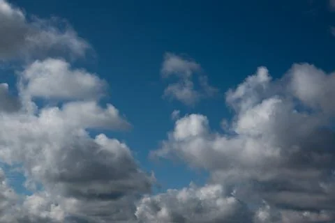 Blue sky background with clouds Stock Photos