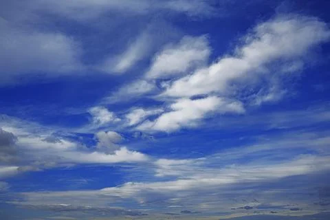 Blue sky background with clouds Stock Photos