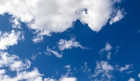 Blue sky background with clouds Stock Photos