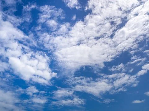 Blue sky background. clouds in the sky. Blue sky with some clouds. blue sky c Stock-Fotos