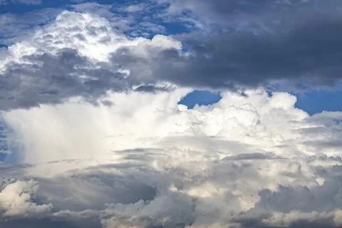 Blue sky background. The clouds on the sky. Colorful blue sky view in brigh.. Stock Photos