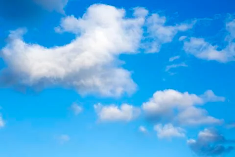 Blue sky background with clouds view. Nature photo. Stock Photos