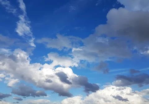 Blue sky background with clouds view. Nature photo. Stock Photos