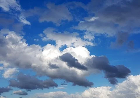 Blue sky background with clouds view. Nature photo. Stock Photos
