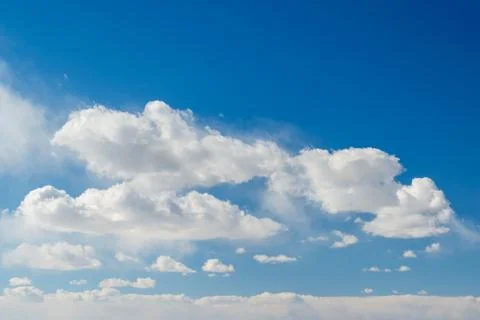 Blue sky background with Cumulus clouds Stock Photos